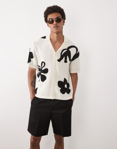 ASOS DESIGN – Gräddvit och svart, stickad topp med avslappnad passform, heltäckande blomtryck och platt krage - view 1