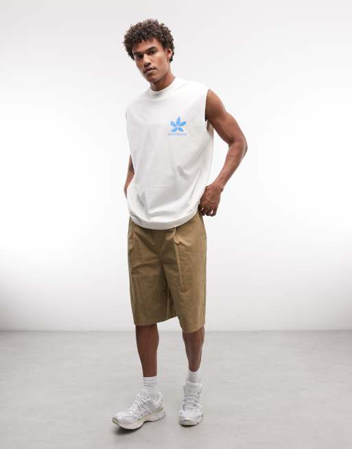 ASOS DESIGN – Gräddvit t-shirt i oversized fit med blomtryck, 2 av 5