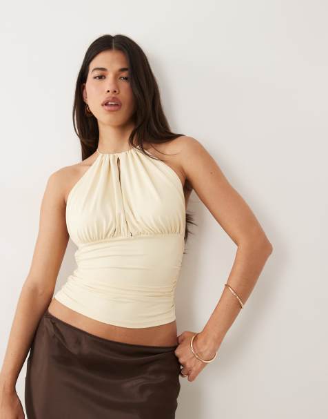 ASOS DESIGN – Gräddvit topp i polyamid med hög krage, markerad midja och halterneck - view 1