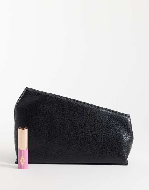 ASOS DESIGN grainy asymmetric clutch in black, 2 of 4