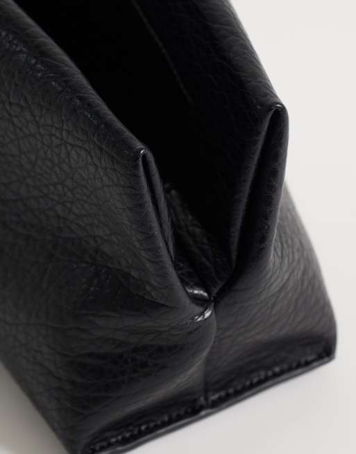ASOS DESIGN grainy asymmetric clutch in black, 3 of 4
