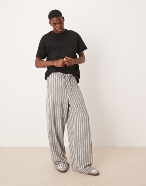 ASOS DESIGN – Gråmelerade, extra baggy mjukisbyxor med ränder - view 1