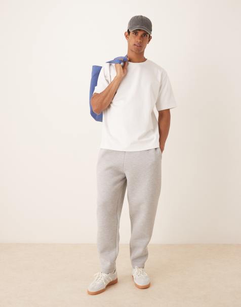 ASOS DESIGN – Gråmelerade, kraftiga, avsmalnande mjukisbyxor i scubaliknande tyg - view 1