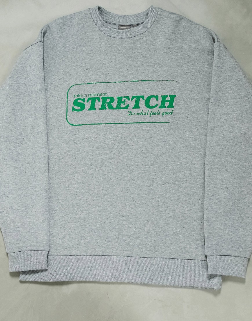 ASOS DESIGN - Gråmeleret oversized sweatshirt med 'stretch wellness'-print på brystet