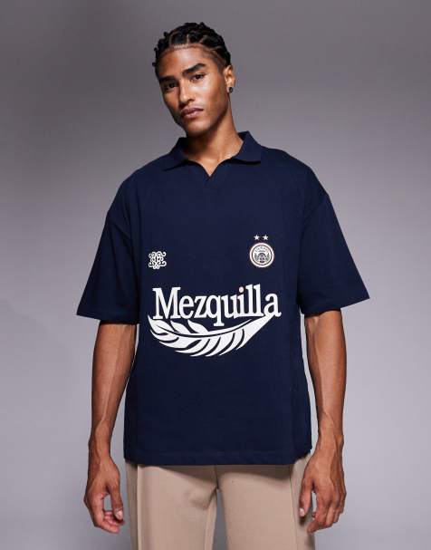 ASOS DESIGN heavyweight oversized polo with football graphic and panelling in navy - NAVY