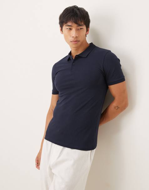 ASOS DESIGN Essentials muscle fit polo in navy pique  