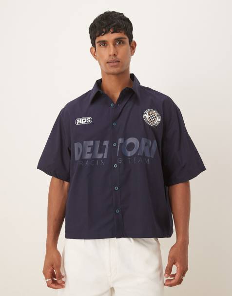 ASOS DESIGN boxy oversized shirt with sport print in navy 