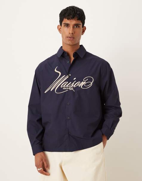 ASOS DESIGN oversized shirt with chest embroidery in navy cotton poplin