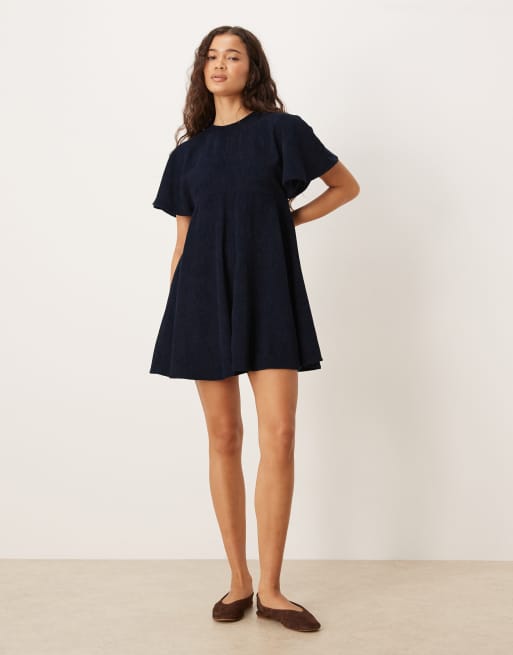 ASOS DESIGN – Granatowa sztruksowa sukienka koszulowa mini z ozdobnymi przeszyciami