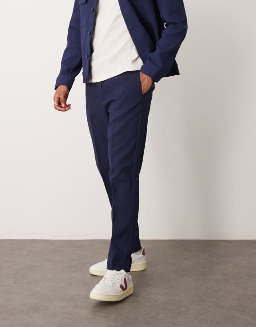 ASOS DESIGN – Granatowe eleganckie spodnie wciągane o zwężanym kroju z prążkowanego materiału, część zestawu