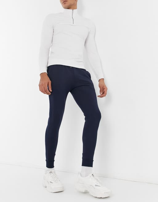 ASOS DESIGN - Granatowe joggersy o bardzo obcisłym kroju 