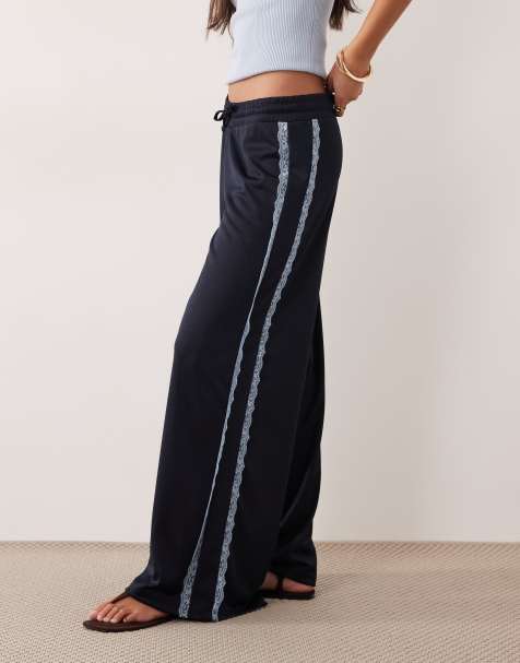 ASOS DESIGN – Granatowe trykotowe joggersy z szerokimi nogawkami i koronką - view 1