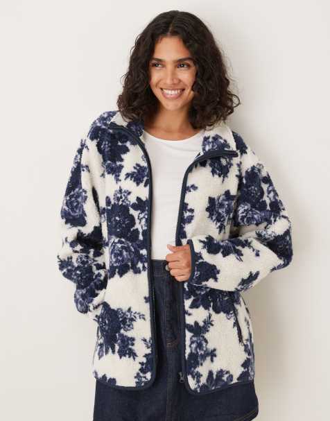ASOS DESIGN zip through borg fleece in navy and cream floral design