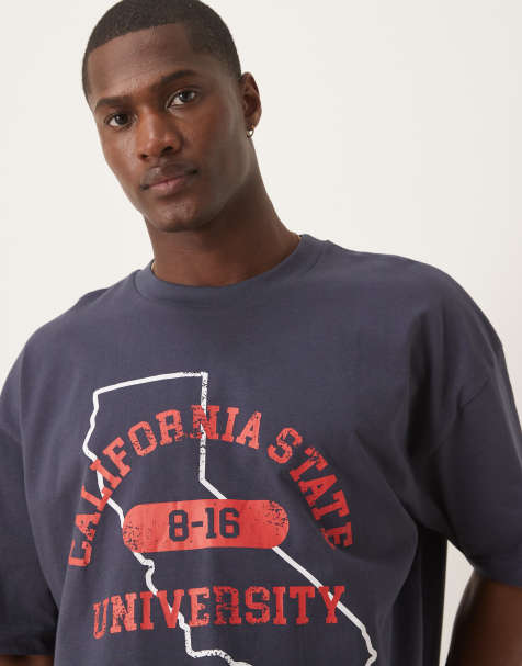ASOS DESIGN cropped oversized t-shirt with varsity graphic in navy