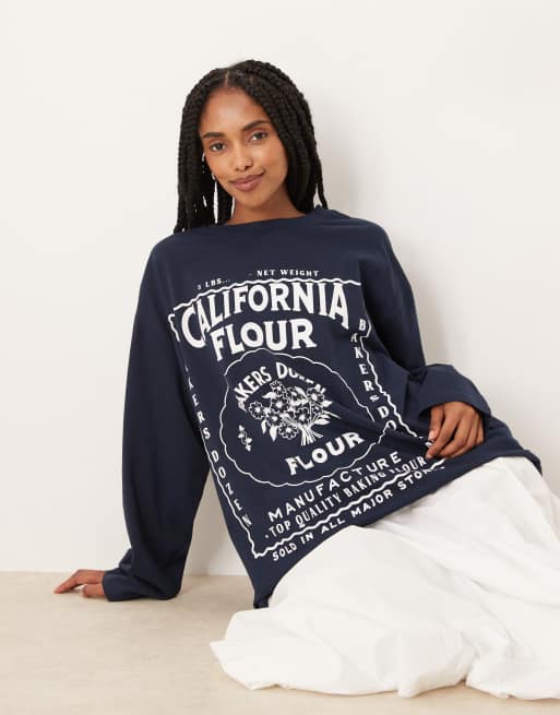 ASOS DESIGN – Granatowy T-shirt skater z długim rękawem i grafiką z napisem „California”