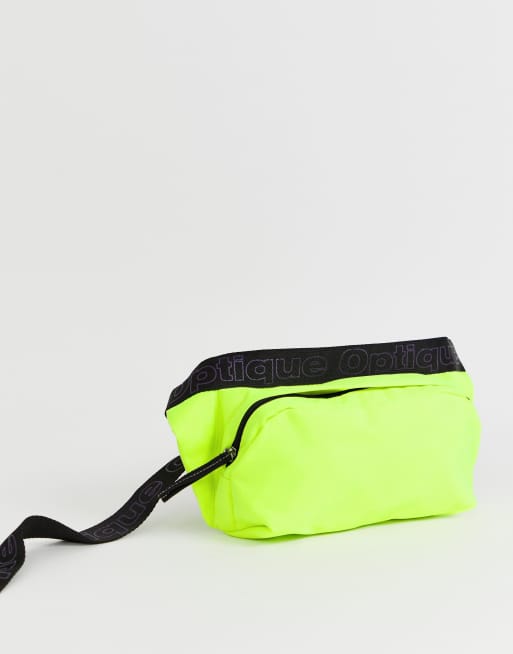 ASOS DESIGN Grand sac banane bandouli re avec sangle inscription Jaune fluo