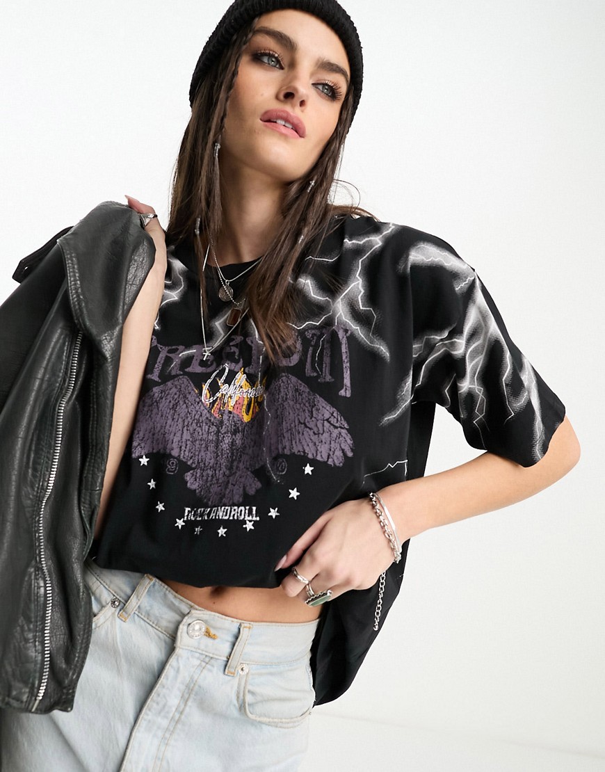 ASOS DESIGN graphic oversized rock tee with lightening in washed black