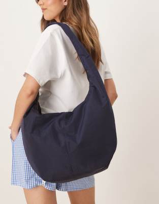 ASOS DESIGN - Große, weiche Tragetasche zum Umhängen in Marineblau