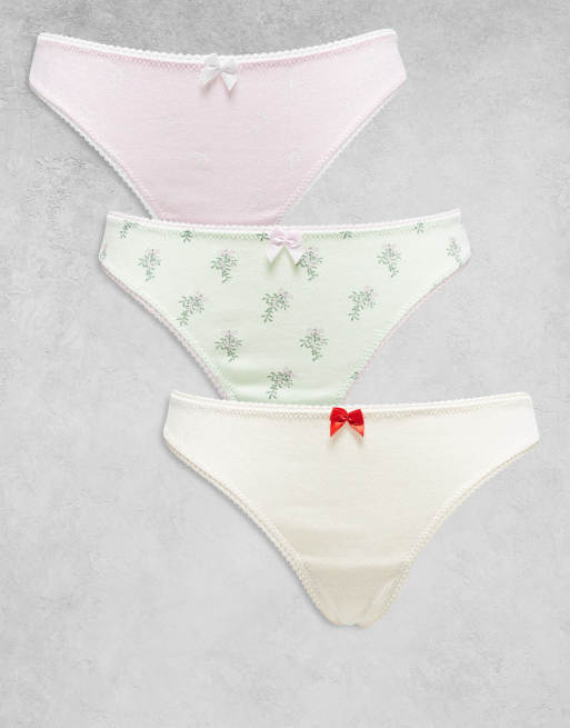 ASOS DESIGN – Gröna, gräddvita och rosa, pointellestickade stringtrosor med rosetter och mistelmönster, 3-pack