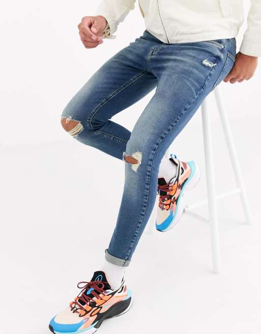 ASOS DESIGN – Gröntonade jeans med spray on-passform i powerstretch med revor
