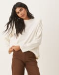[ASOS DESIGN] ASOS DESIGN grown on neck long sleeve crew top with shoulder pads in cream-White XS CREAM