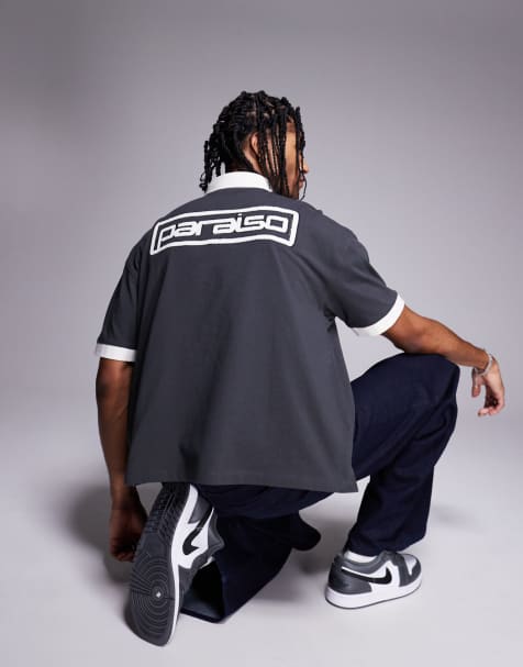 ASOS DESIGN heavyweight boxy polo in with canvas collar and applique in black 