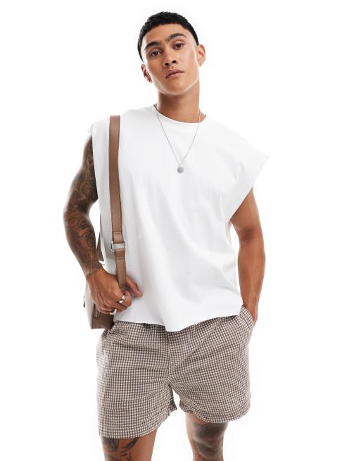 ASOS DESIGN – Gruby biały T-shirt o fasonie extreme oversize bez rękawów z surowym wykończeniem 