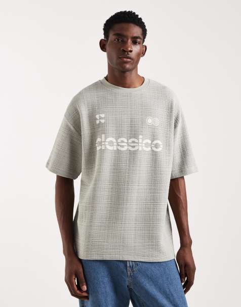 ASOS DESIGN – Gruby fakturowany T-shirt oversize w kolorze zielonym z grafiką z kwiatkiem - view 1