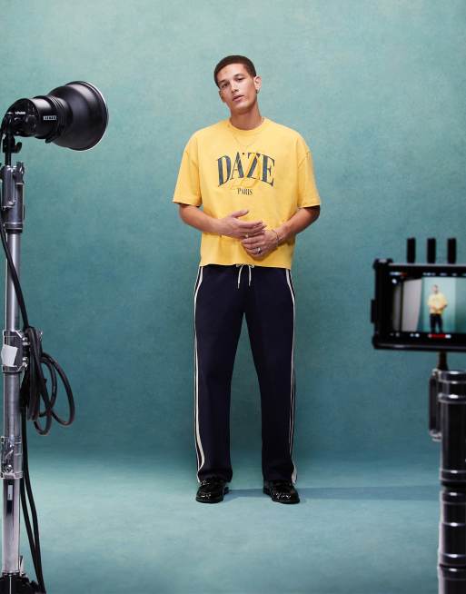 ASOS DESIGN – Gruby T-shirt oversize o pudełkowym kroju i gramaturze 220 g/m² w spranym żółtym kolorze z nadrukiem z przodu