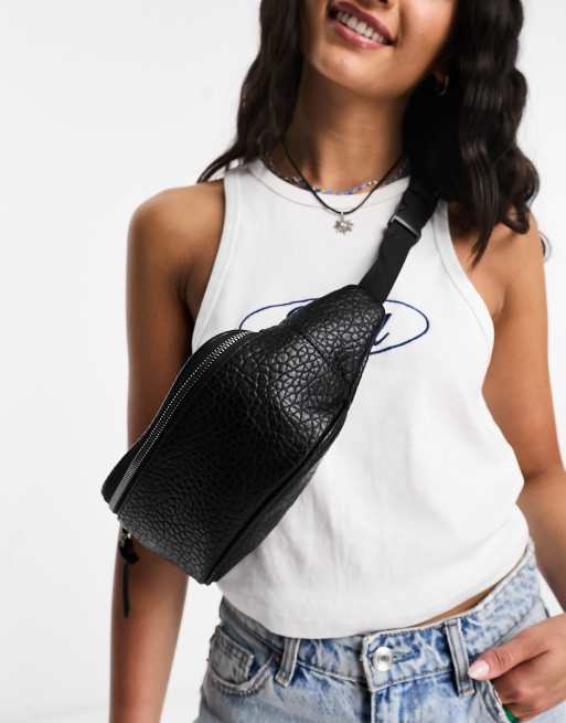 ASOS DESIGN grunge bumbag in black