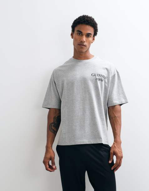 ASOS DESIGN Guinness pyjama set with Christmas print in grey and black - view 1