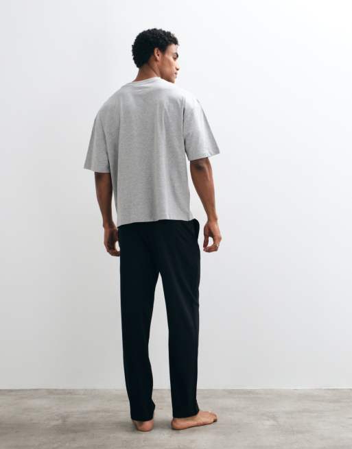ASOS DESIGN Guinness pyjamaset met Christmasprint in grijs en zwart, 4 van 4