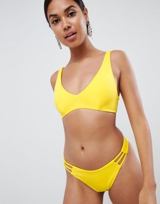 ASOS DESIGN – Gul bikiniunderdel i återvunnet material med hög benskärning och remmar i sidorna
