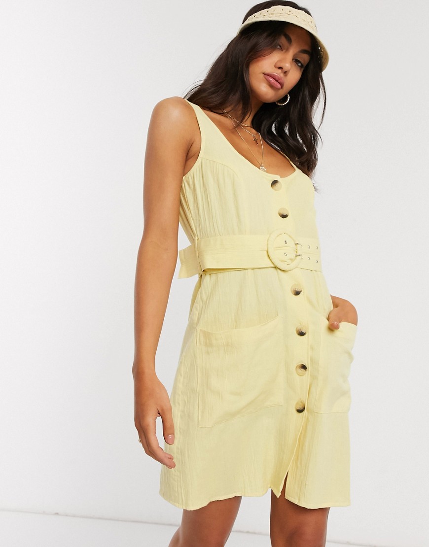 ASOS DESIGN – Gul, kort solklänning i linne med knappar och knytskärp