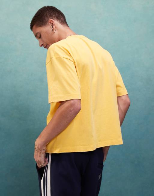 ASOS DESIGN – Gul, kraftig t-shirt i oversize med boxig passform och tryck framtill, 220gsm, 3 av 4