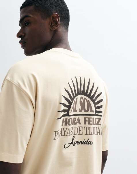ASOS DESIGN – Gul, tvättad, kraftig t-shirt i oversize med soltryck - view 1