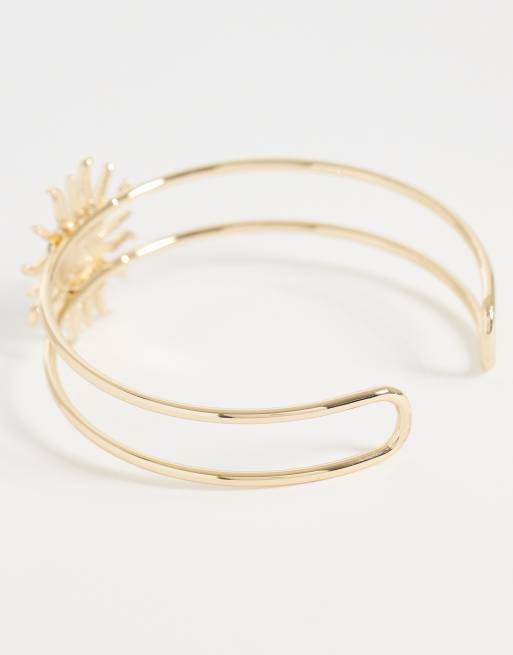 ASOS DESIGN – Guldfärgad armring med omlottdesign och soldesign, 3 av 3