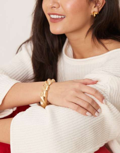 ASOS DESIGN – Guldfärgad armring med vriden, borstad design - view 1