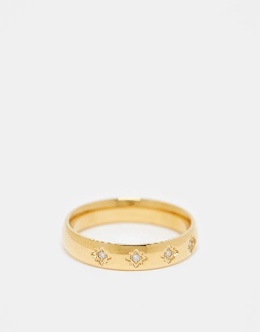 ASOS DESIGN – Guldfärgad ring i rostfritt stål med stjärnformade strassdetaljer