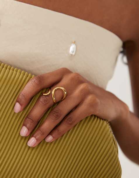 ASOS DESIGN – Guldfärgad ring i vattentåligt, rostfritt stål med omlottdesign - view 1