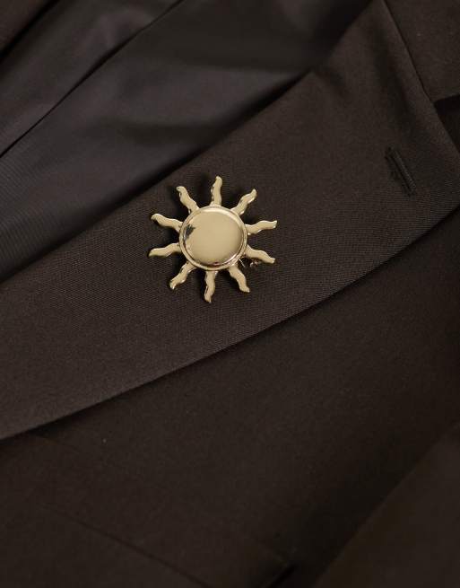 ASOS DESIGN – Guldfärgad solbrosch, 2 av 3