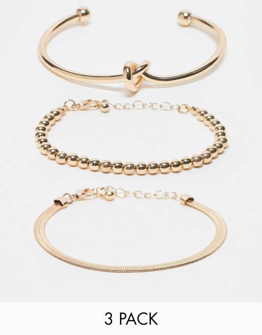 ASOS DESIGN – Guldfärgade armband med knut- och kuldetaljer, 3-pack