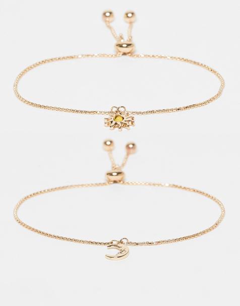 ASOS DESIGN – Guldfärgade armband med sol- och månberlocker, 2-pack - view 1
