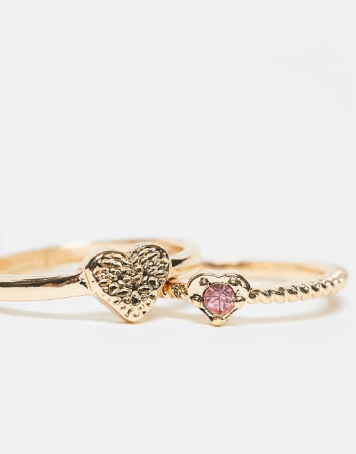 ASOS DESIGN – Guldfärgade ringar med rosa, glittrig hjärtdesign, 3-pack, 2 av 3
