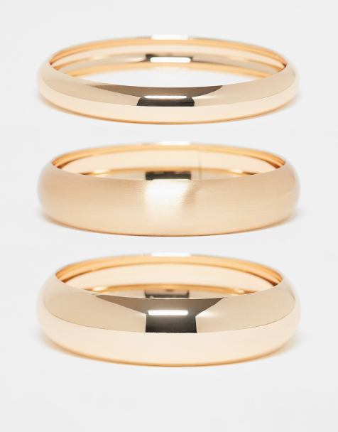 ASOS DESIGN – Guldfärgade, styva armband, 3-pack - view 1