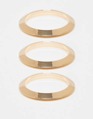 ASOS DESIGN – Guldfärgade, styva armband med hamrad design, 3-pack - view 1