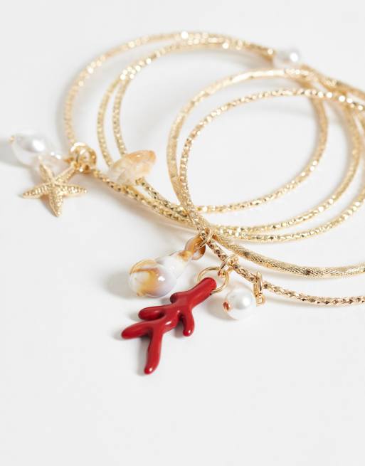 ASOS DESIGN – Guldfärgade, tunna armband med havsberlocker, i flerpack, 3 av 3