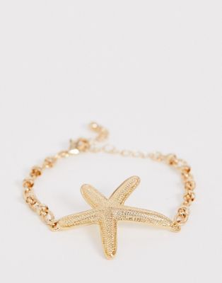 ASOS DESIGN – Guldfärgat armband med hamrad länkkedja och sjöstjärneberlock