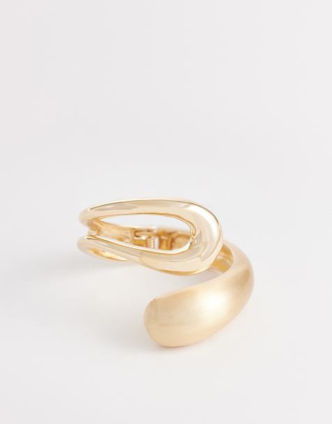 ASOS DESIGN – Guldfärgat, borstat cuff-armband med omlottdesign - view 1