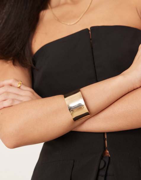 ASOS DESIGN – Guldfärgat, brett, stelt armband - view 1